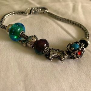 Add-aCharm silver bracelet - think Pandora. Beautiful bracelet links.